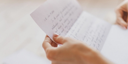 Loyola web3-handwritten-letter-hands-woman-post-shutterstock_611511482-janna-golovacheva-ai1.jpg