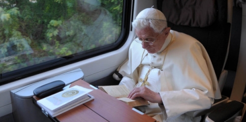 web3-pope-benedict-xvi-reading-osservatore-romano-afp.jpg